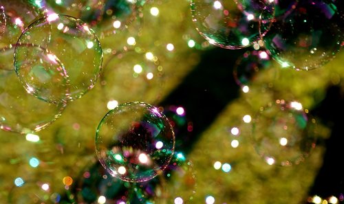 soap bubbles  colorful  flying