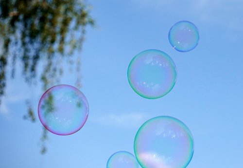 soap bubbles  colorful  flying