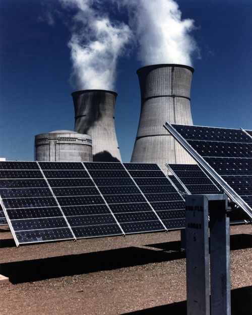 solar panel array nuclear plant cooling towers