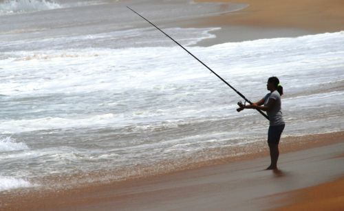 Solitary Woman Fishing