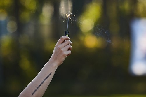 sparkler  holding  hands