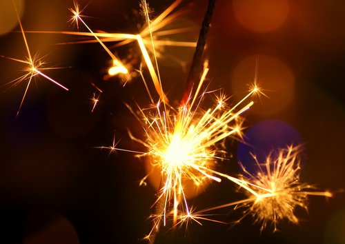 sparkler  sparks  new year's eve