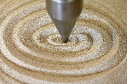 spiral pendulum sand