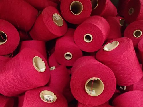 spools pink round yarn