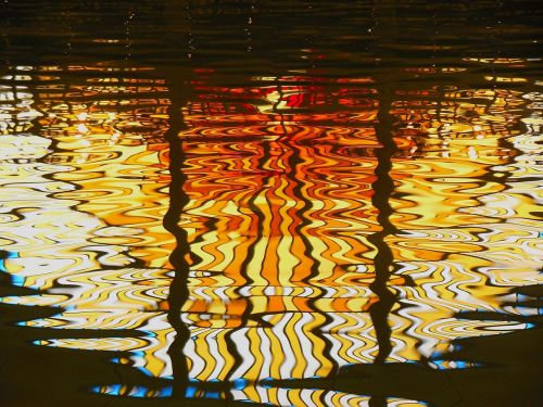 stained glass window reflection water colorful