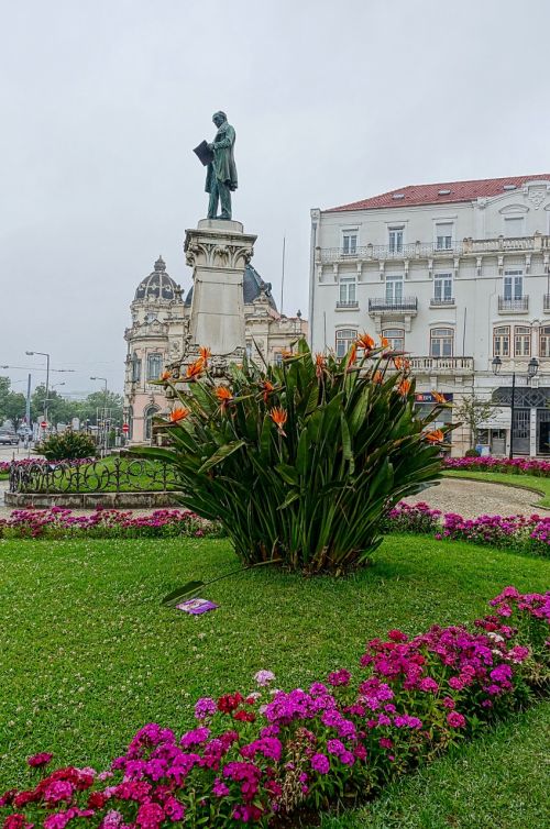 statue urban flowers