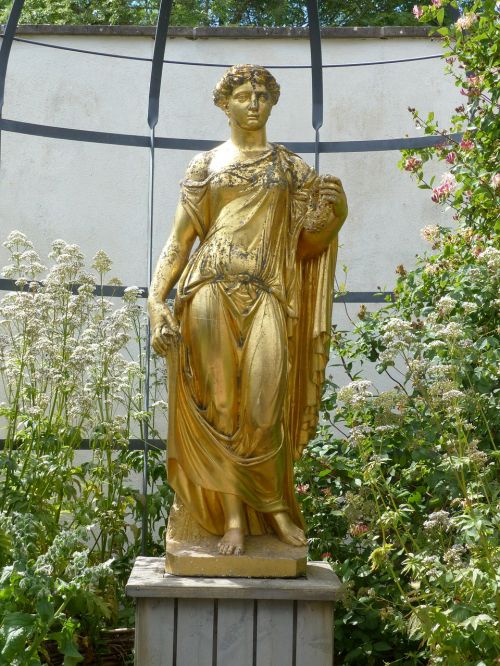 statue gold flowers