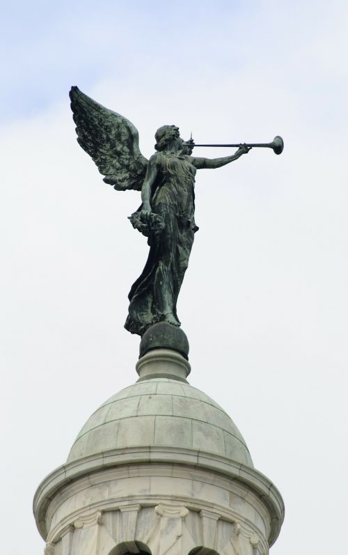 statue wings sky