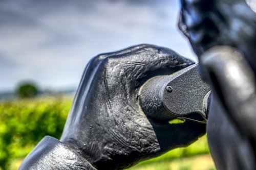 statue  figure  binoculars