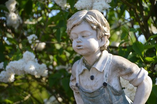 statue  boy  boy in overalls