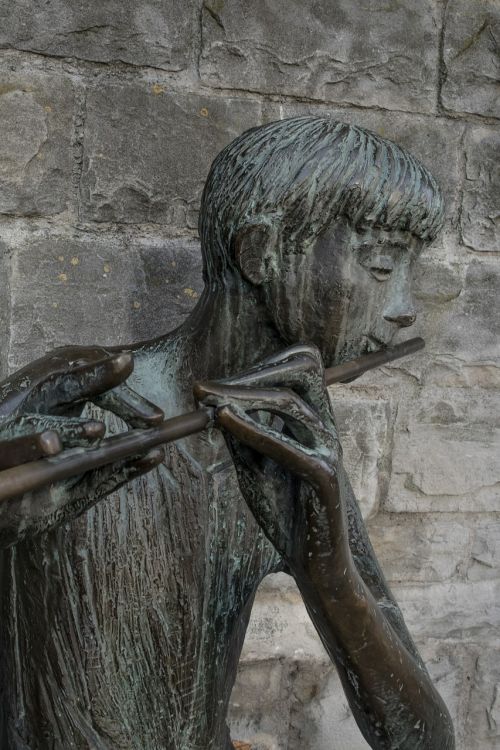 statue bronze statue musical instrument