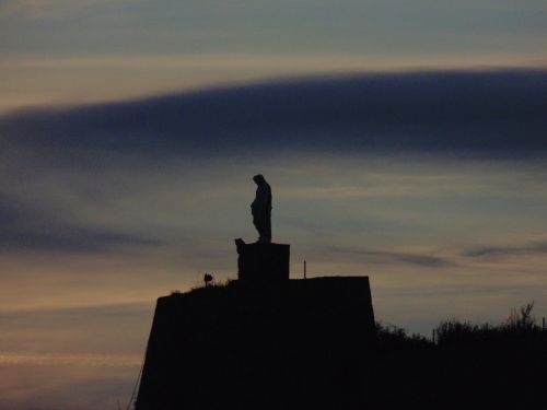 statue profile sunset