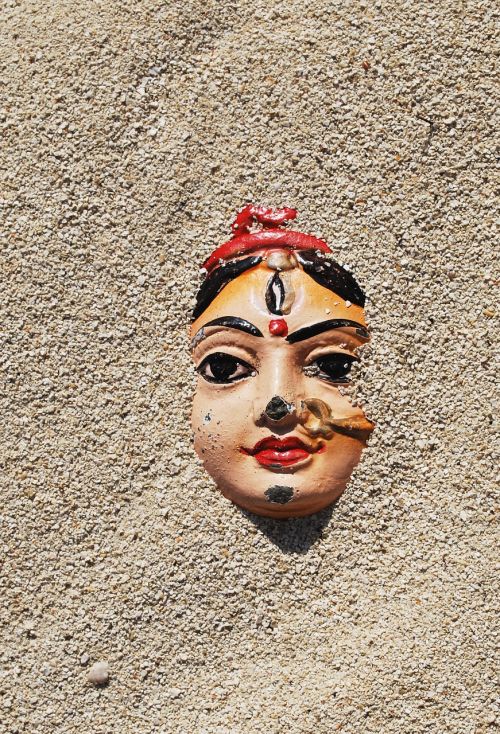 statue face sand