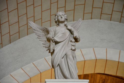 statue angel carved stones church tinteniac brittany