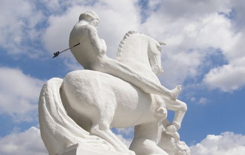 statue man on horseback 1927 arrow in the back