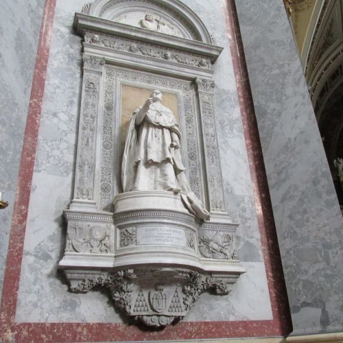Statue Of A Priest