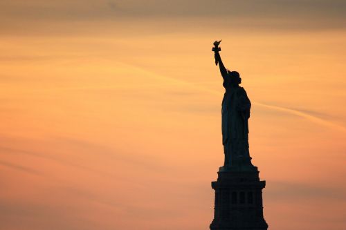 statue of liberty new york sunset