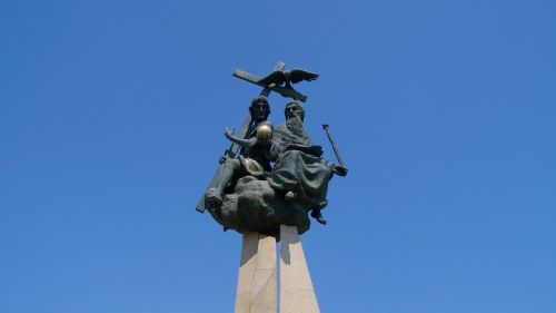 statue of the holy trinity blue sky mohács