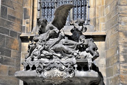 statues prague historically