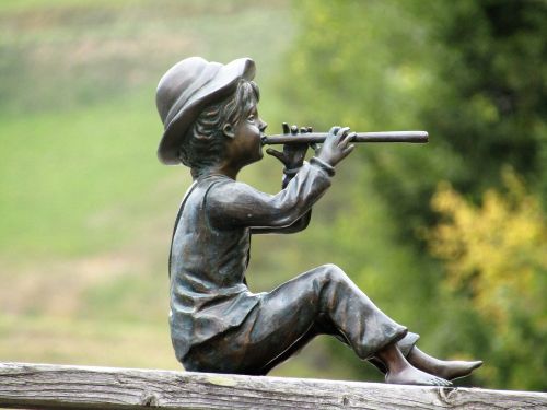 statuette flutist a cowherd boy
