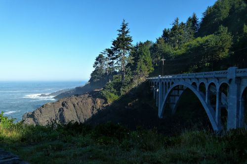 stone bridge building shoreline