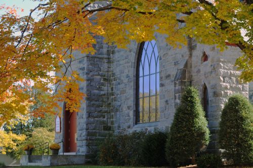 Stone Church And Autumn Tree