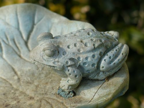 stone figure frog figure