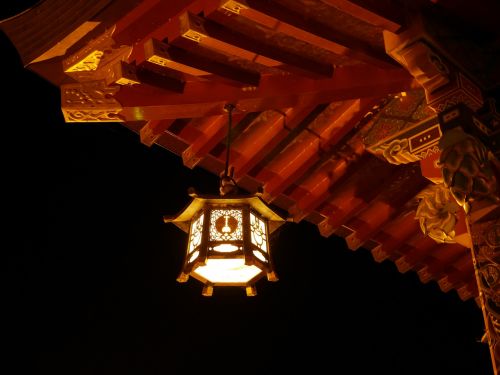 stone lanterns shrine night