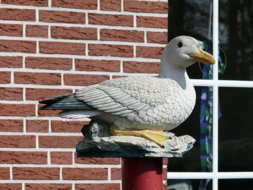 stone seagull seagull sculpture