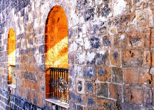 stone wall arches window
