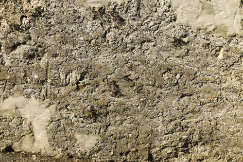 stone wall plastered weathered