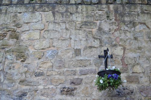 Stone Wall And Flowers