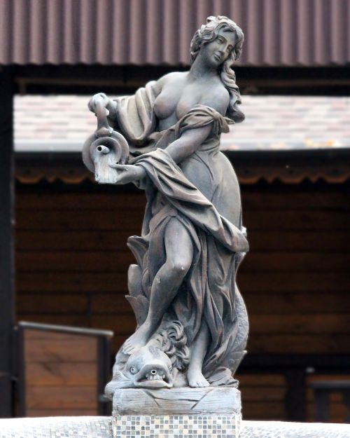 stone woman fountain park sculpture