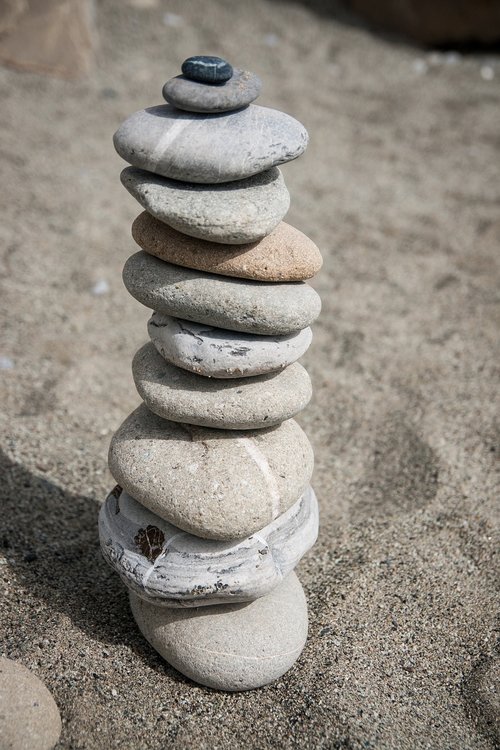 stones  stone tower  sand