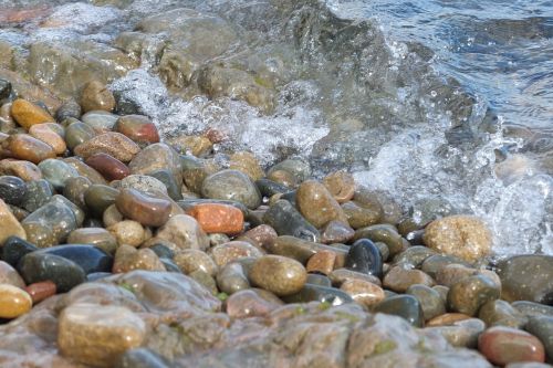 stones water sea