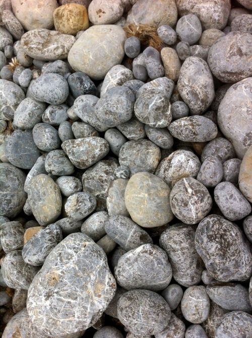 stones pebbles sea