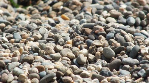 stones pebbles sea