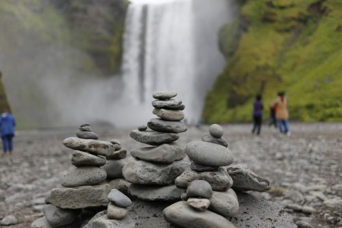 stones marking the way waterfall iceland