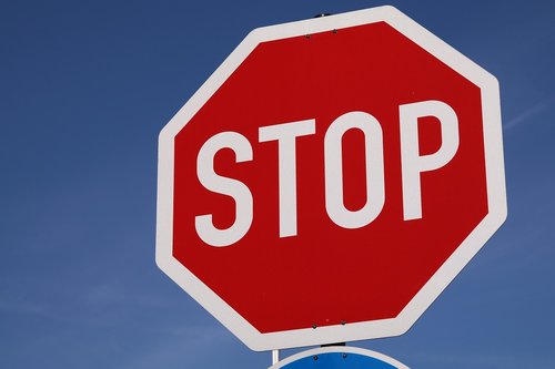 stop  shield  road sign