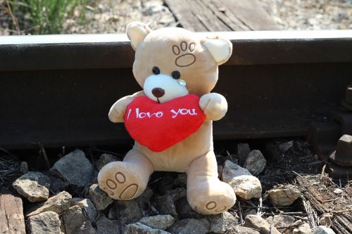 stop children suicide teddy bear crying railway