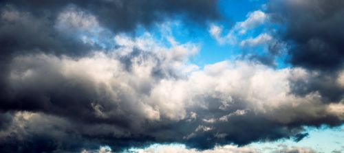 storm clouds the sky