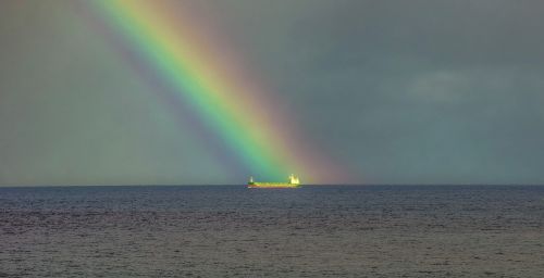 storm rainbow ship