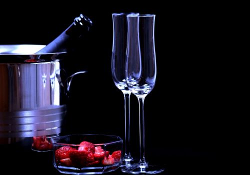 strawberries champagne glasses romance