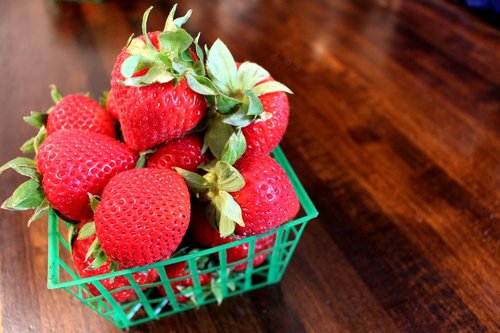 strawberries  basket of berries  red