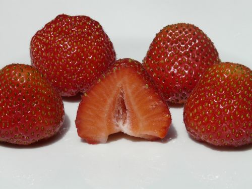 strawberries cut in half fruit