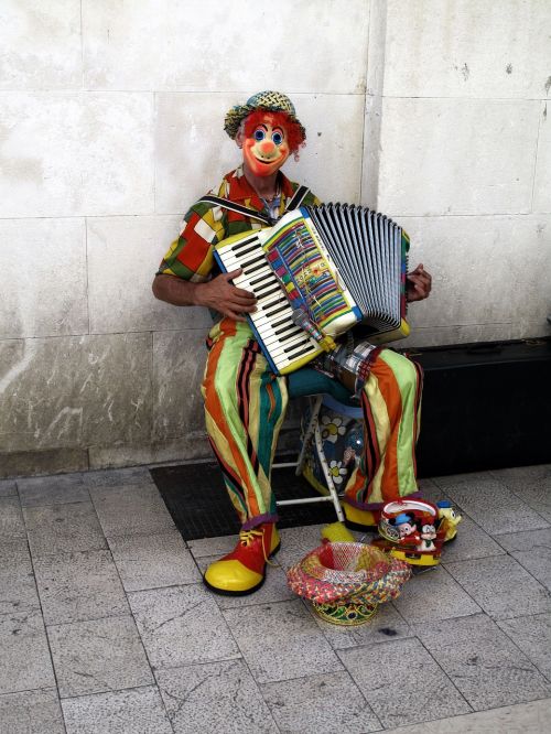 street musician clown accordion