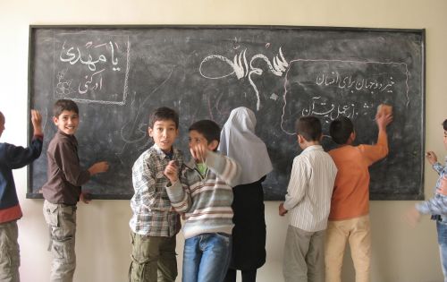 students chalkboard village