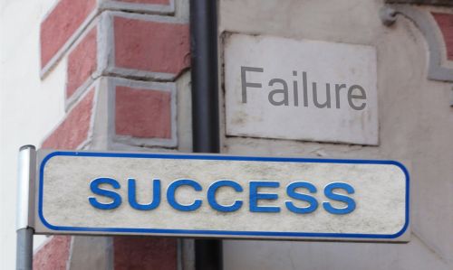 success failure street sign