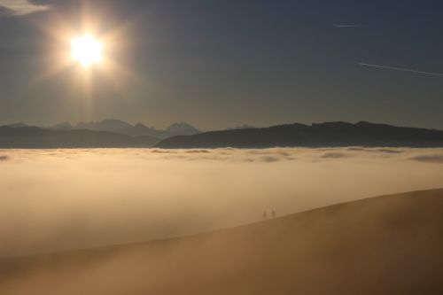 sun people in the sea of fog mountain landscape