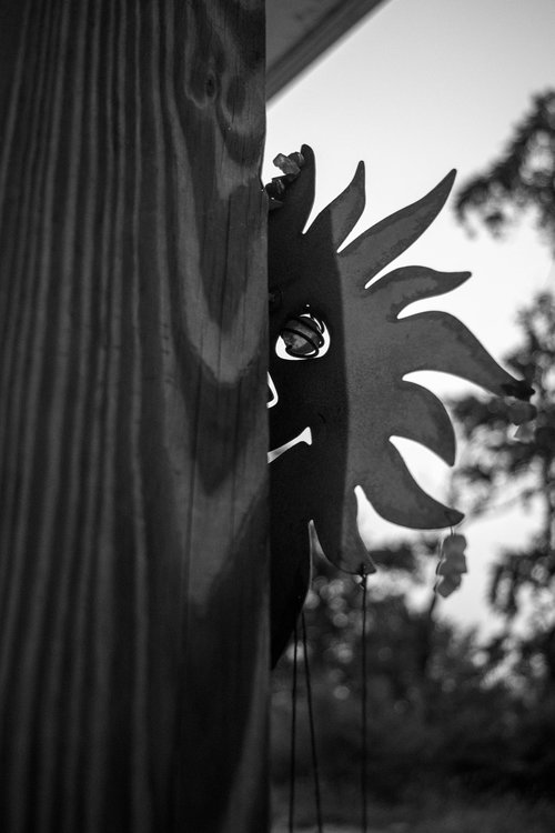 sun  black and white  wind chime